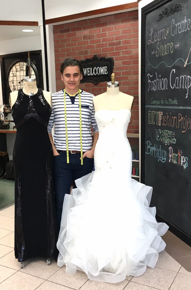 Reach Fashion Owner Giovanni with two formal dresses