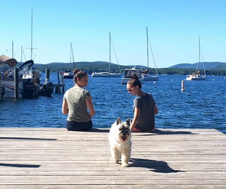 my daughters and dog on the dock at the Wolfeboro Inn