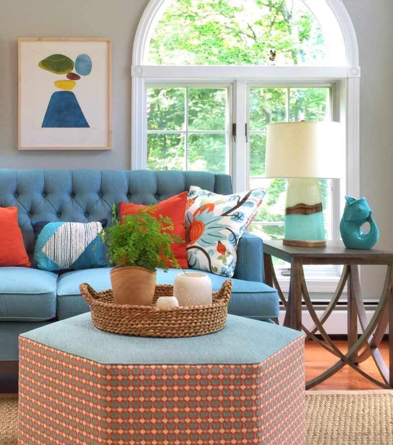 Redecorated sunroom with pops of color