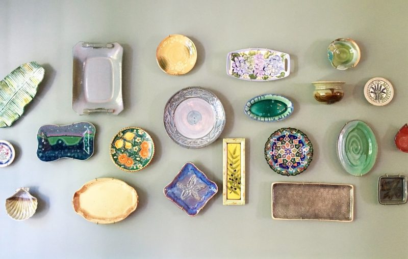 sunroom Colorful Pottery Wall in Dining Room