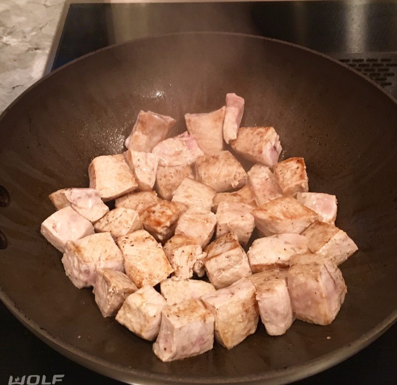 swordfish sauteing in pan