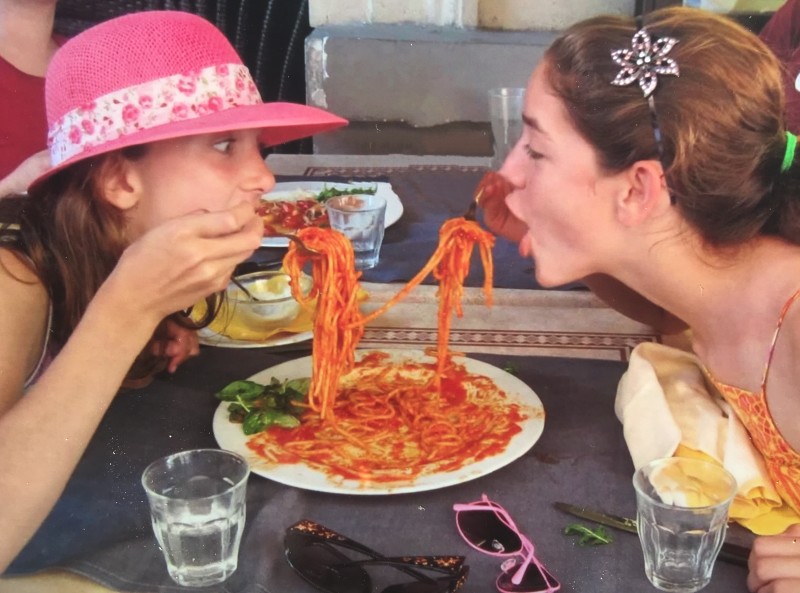 Julia and Ally eating spaghetti in Rome - an excerpt from Musing Mediterranean