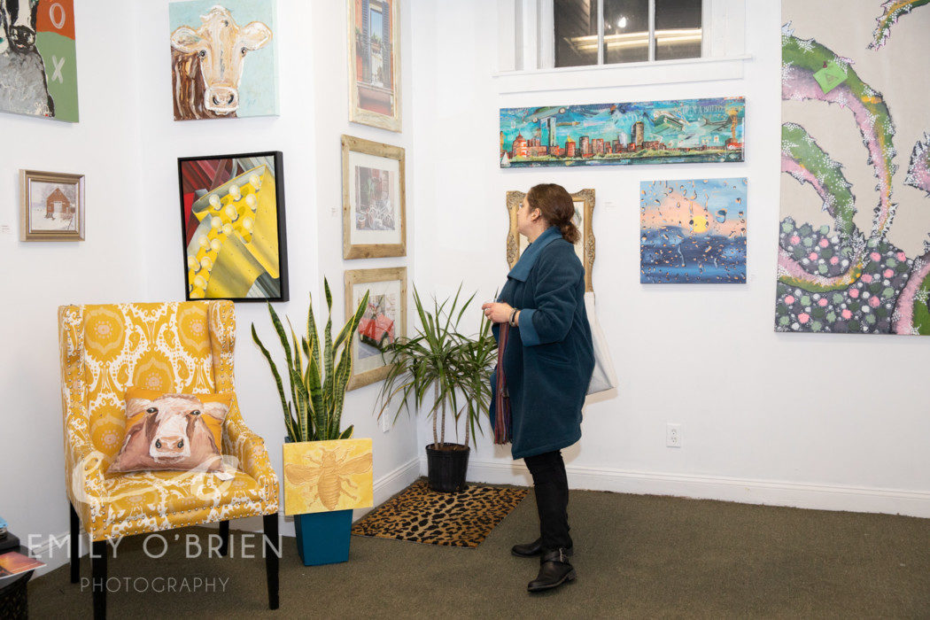 guest viewing art at pop-up art gallery